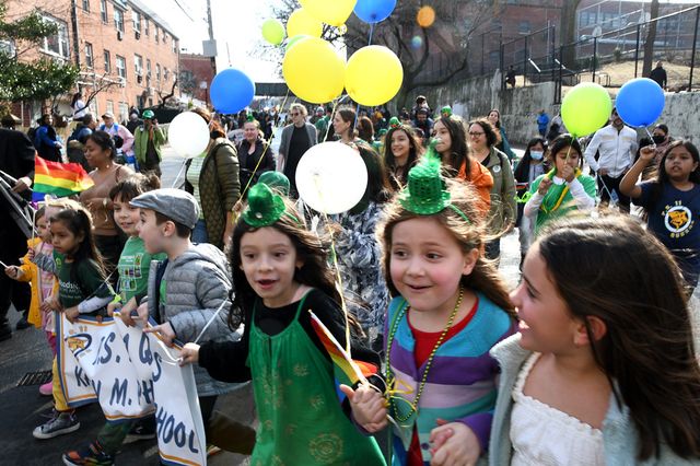 kids march in a St. Pat's Day parade